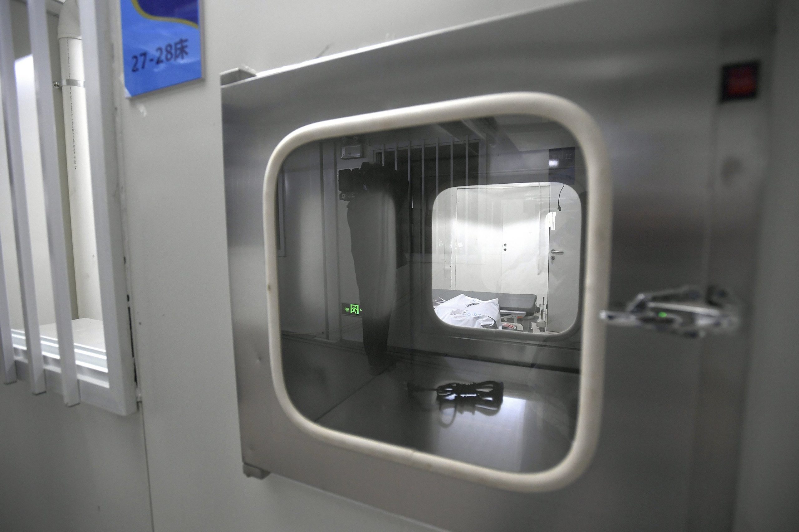 Built in 10 days, China’s virus hospital takes 1st patients