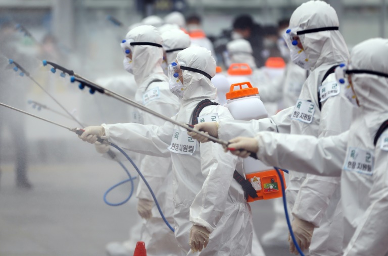 Global virus death toll tops 3,000 as South Korea cases soar