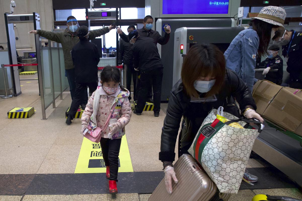 As Wuhan reopens, people begin to venture outside