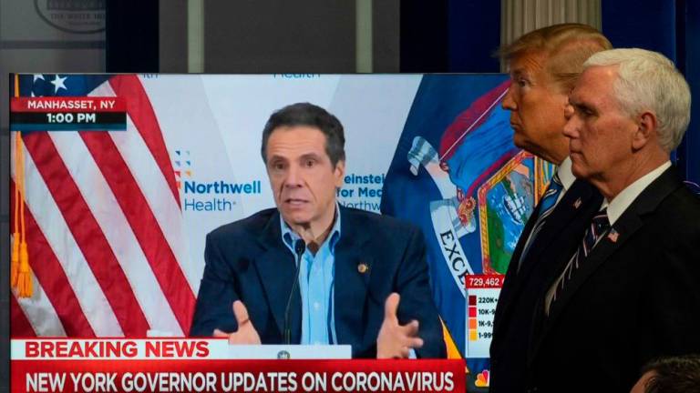 New York passes virus ‘high point’ as Trump, governors feud