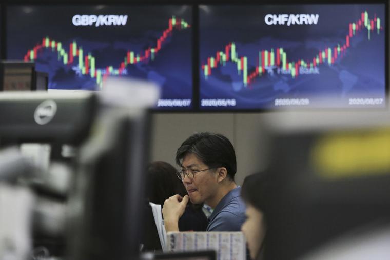 Asian shares skid amid virus woes, China-US trade tensions