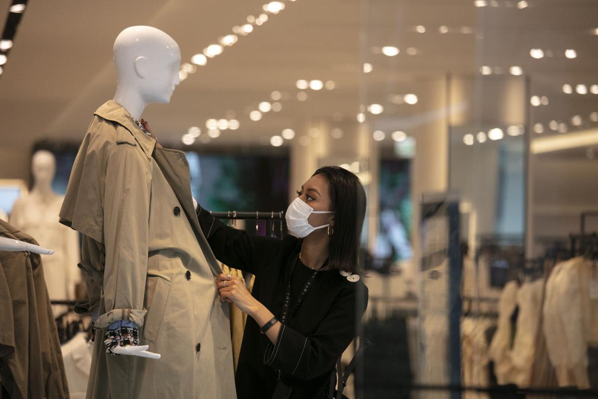 Japan’s economy shrinks at record rate, slammed by pandemic
