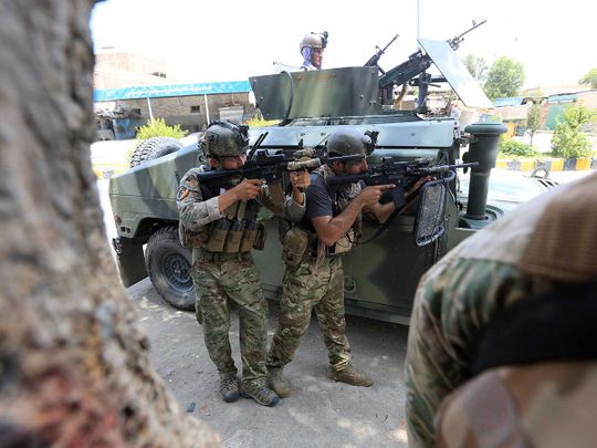 At least 20 dead in raid on Afghan prison claimed by IS: officials