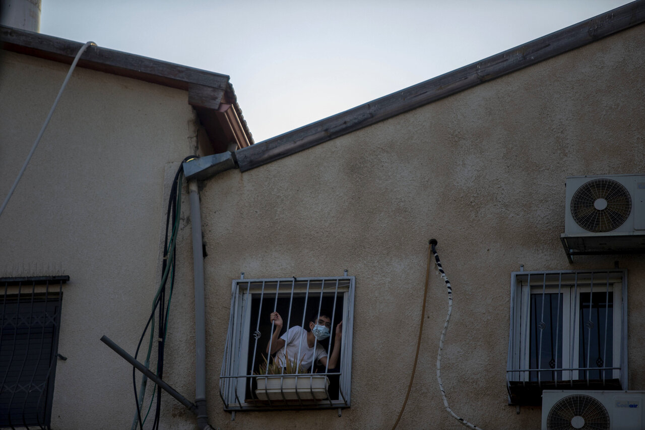 Israel imposes overnight curfews as virus deaths pass 1,000