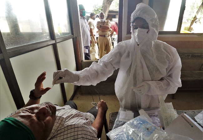 With spike of 55,838 cases, India’s COVID-19 tally crosses 77-lakh mark