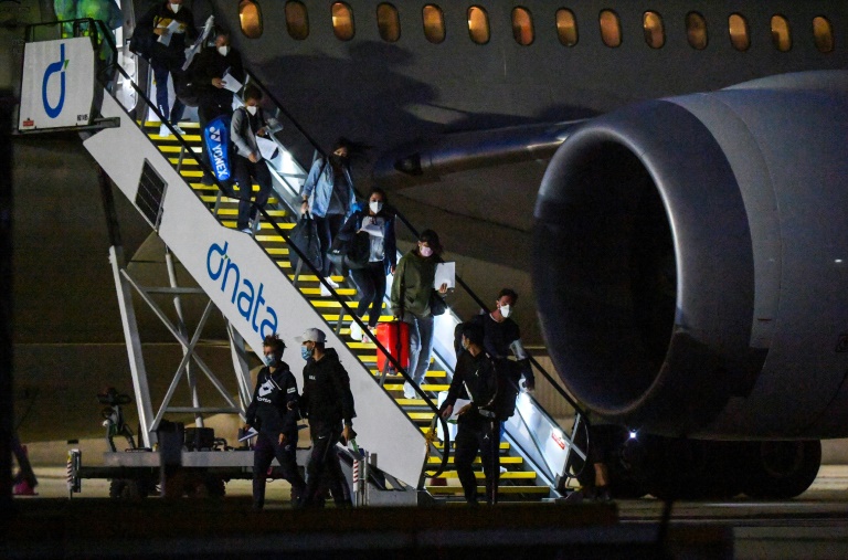 Disarray as two test positive for virus on Australian Open plane