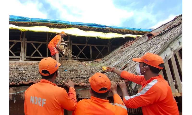 India begins landslide, flood clean-up as deadly monsoon rains ease