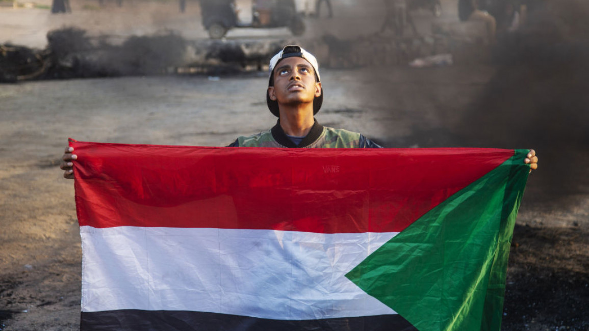 Sudan PM released as protesters face tear gas