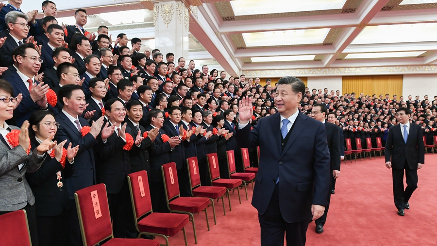 Xi meets with role models for building peaceful China
