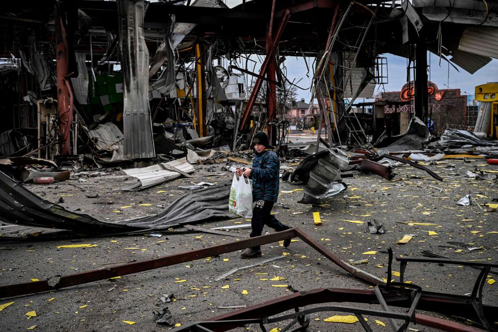 Russia hits Ukraine from air, land and sea with civilians trapped