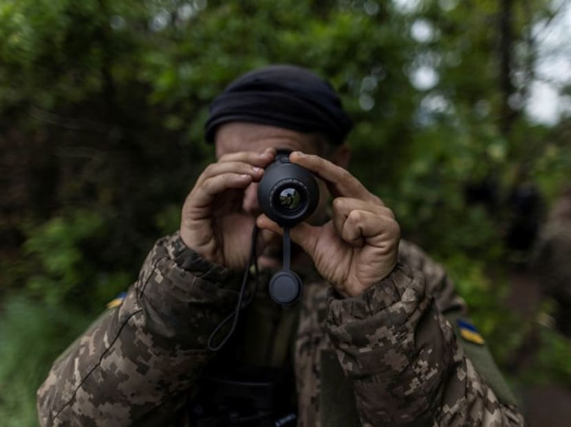 Russian forces battle to surround Ukrainians in east