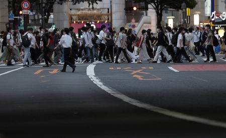 Japan’s daily COVID-19 cases hit record high of 250,403