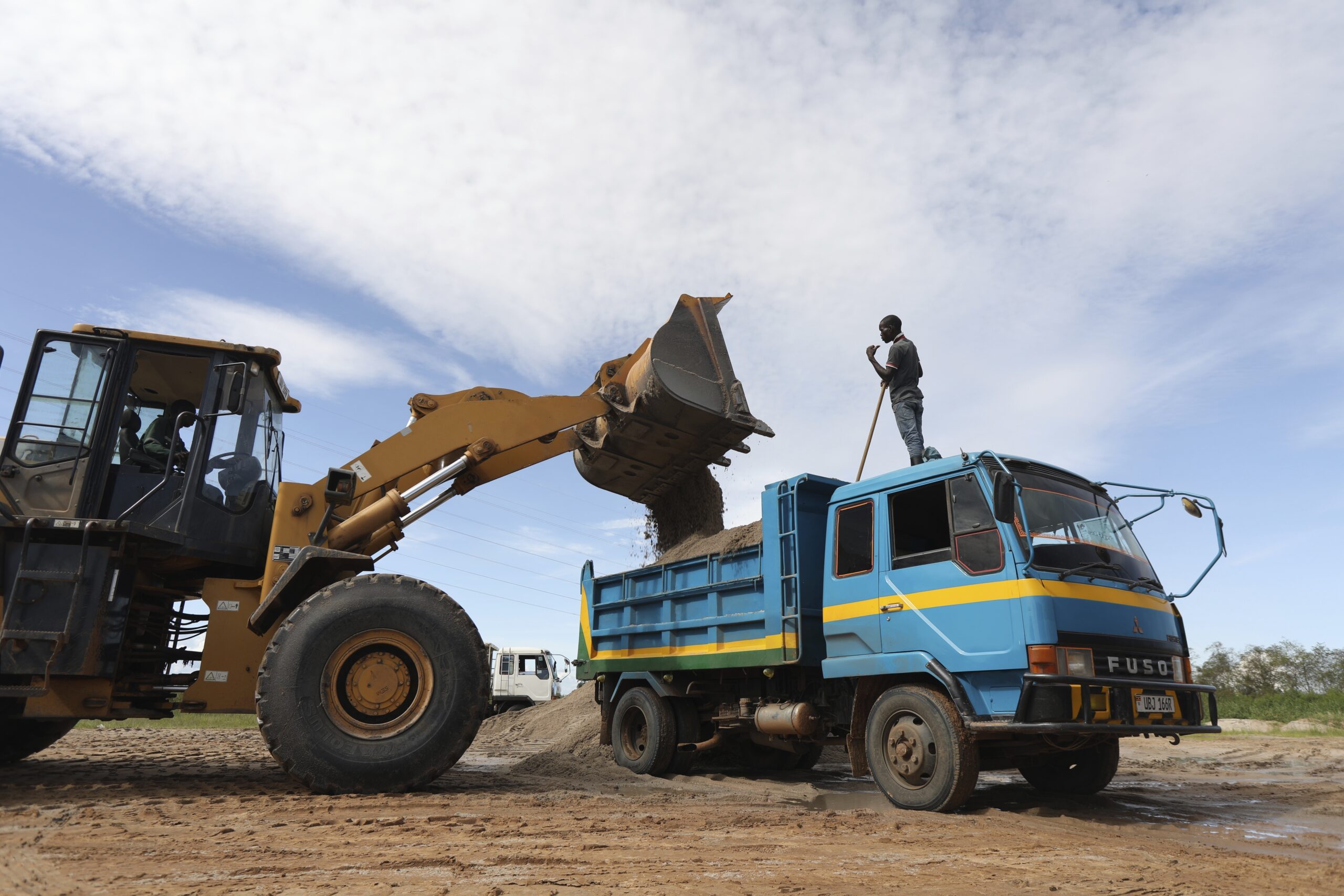 As sand miners prosper in Uganda, a vital lake basin suffers
