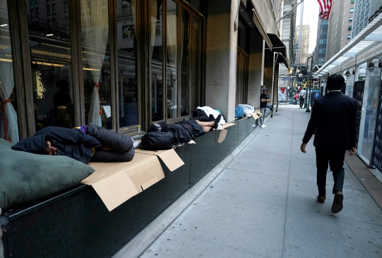Migrants sleep outside as New York mayor says city is full